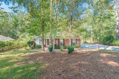 This stunning 3-bedroom, 2-bath home with a spacious flex room on The Golf Club At Cedar Creek in South Carolina - for sale on GolfHomes.com, golf home, golf lot