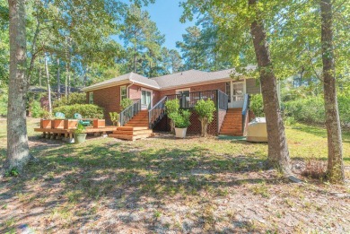 This stunning 3-bedroom, 2-bath home with a spacious flex room on The Golf Club At Cedar Creek in South Carolina - for sale on GolfHomes.com, golf home, golf lot