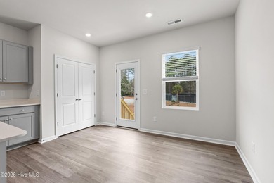 The Givens offers a beautifully crafted two-story design that on Harbour Point Golf Club in North Carolina - for sale on GolfHomes.com, golf home, golf lot