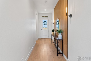 Highly appointed ranch situated on a spacious corner lot with on Raindance National Golf Course in Colorado - for sale on GolfHomes.com, golf home, golf lot