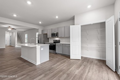 The Givens offers a beautifully crafted two-story design that on Harbour Point Golf Club in North Carolina - for sale on GolfHomes.com, golf home, golf lot