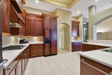 PRICE REDUCED! Luxury living in the Osprey Pointe Subdivision of on Hunters Green Country Club in Florida - for sale on GolfHomes.com, golf home, golf lot