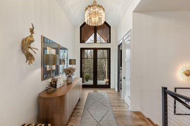 Completed in 2021, this beautifully crafted mountain home offers on Cullasaja Club in North Carolina - for sale on GolfHomes.com, golf home, golf lot