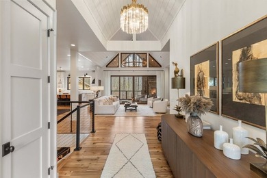 Completed in 2021, this beautifully crafted mountain home offers on Cullasaja Club in North Carolina - for sale on GolfHomes.com, golf home, golf lot