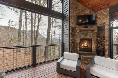 Completed in 2021, this beautifully crafted mountain home offers on Cullasaja Club in North Carolina - for sale on GolfHomes.com, golf home, golf lot