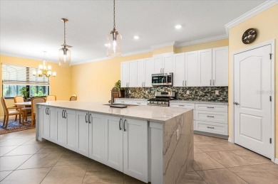 Discover luxury and tranquility in this exceptional pool home on Rosedale Golf and Tennis Club in Florida - for sale on GolfHomes.com, golf home, golf lot