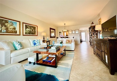 Immaculate and beautifully updated unit in a desirable 55+ on Sunrise Lakes Phase III in Florida - for sale on GolfHomes.com, golf home, golf lot