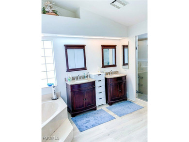 Welcome home to your private lakeside retreat in the highly on Cross Creek Country Club in Florida - for sale on GolfHomes.com, golf home, golf lot