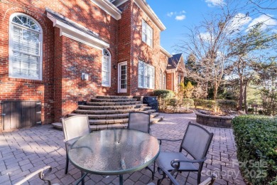 Welcome to this elegant brick home in a prime Tega Cay location on Tega Cay Golf Club in South Carolina - for sale on GolfHomes.com, golf home, golf lot