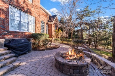 Welcome to this elegant brick home in a prime Tega Cay location on Tega Cay Golf Club in South Carolina - for sale on GolfHomes.com, golf home, golf lot