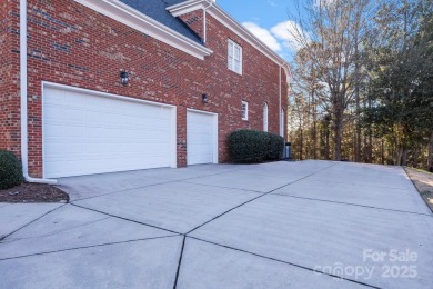 Welcome to this elegant brick home in a prime Tega Cay location on Tega Cay Golf Club in South Carolina - for sale on GolfHomes.com, golf home, golf lot