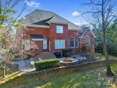 Welcome to this elegant brick home in a prime Tega Cay location on Tega Cay Golf Club in South Carolina - for sale on GolfHomes.com, golf home, golf lot