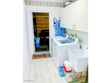 Welcome home to your private lakeside retreat in the highly on Cross Creek Country Club in Florida - for sale on GolfHomes.com, golf home, golf lot