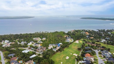 Discover luxury living in this exquisite 3-bedroom, 2.5-bathroom on Bay Point Resort Golf Club in Florida - for sale on GolfHomes.com, golf home, golf lot