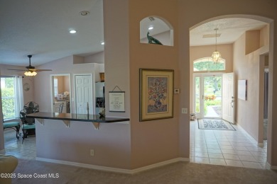 This 3 bedroom 2 bathroom home with high ceilings and relaxing on Majors Golf Club At Bayside Lakes in Florida - for sale on GolfHomes.com, golf home, golf lot