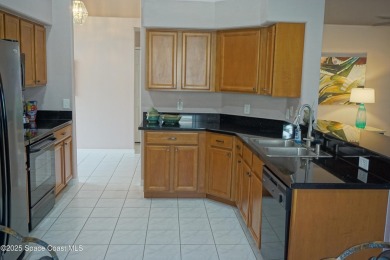 This 3 bedroom 2 bathroom home with high ceilings and relaxing on Majors Golf Club At Bayside Lakes in Florida - for sale on GolfHomes.com, golf home, golf lot