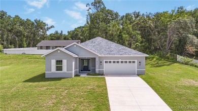 Enjoy the difference that award-winning quality makes in this on Citrus Springs Country Club in Florida - for sale on GolfHomes.com, golf home, golf lot