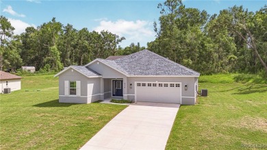 Enjoy the difference that award-winning quality makes in this on Citrus Springs Country Club in Florida - for sale on GolfHomes.com, golf home, golf lot