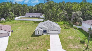 Enjoy the difference that award-winning quality makes in this on Citrus Springs Country Club in Florida - for sale on GolfHomes.com, golf home, golf lot