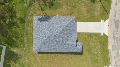 Enjoy the difference that award-winning quality makes in this on Citrus Springs Country Club in Florida - for sale on GolfHomes.com, golf home, golf lot