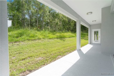 Enjoy the difference that award-winning quality makes in this on Citrus Springs Country Club in Florida - for sale on GolfHomes.com, golf home, golf lot