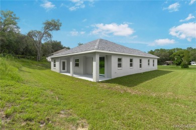 Enjoy the difference that award-winning quality makes in this on Citrus Springs Country Club in Florida - for sale on GolfHomes.com, golf home, golf lot