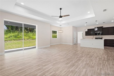 Enjoy the difference that award-winning quality makes in this on Citrus Springs Country Club in Florida - for sale on GolfHomes.com, golf home, golf lot