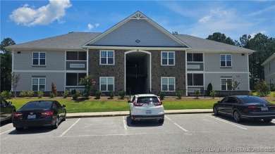 This luxury condo in Fairway Pointe in Anderson Creek Club is on Anderson Creek Golf Club in North Carolina - for sale on GolfHomes.com, golf home, golf lot
