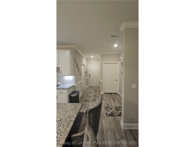 This luxury condo in Fairway Pointe in Anderson Creek Club is on Anderson Creek Golf Club in North Carolina - for sale on GolfHomes.com, golf home, golf lot