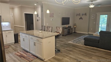 This luxury condo in Fairway Pointe in Anderson Creek Club is on Anderson Creek Golf Club in North Carolina - for sale on GolfHomes.com, golf home, golf lot