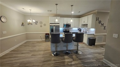 This luxury condo in Fairway Pointe in Anderson Creek Club is on Anderson Creek Golf Club in North Carolina - for sale on GolfHomes.com, golf home, golf lot