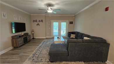 This luxury condo in Fairway Pointe in Anderson Creek Club is on Anderson Creek Golf Club in North Carolina - for sale on GolfHomes.com, golf home, golf lot