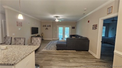 This luxury condo in Fairway Pointe in Anderson Creek Club is on Anderson Creek Golf Club in North Carolina - for sale on GolfHomes.com, golf home, golf lot
