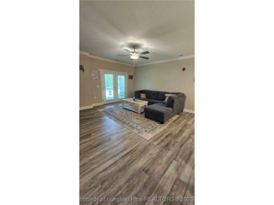 This luxury condo in Fairway Pointe in Anderson Creek Club is on Anderson Creek Golf Club in North Carolina - for sale on GolfHomes.com, golf home, golf lot