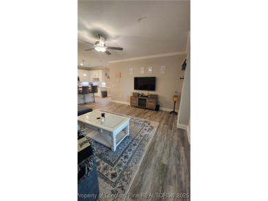 This luxury condo in Fairway Pointe in Anderson Creek Club is on Anderson Creek Golf Club in North Carolina - for sale on GolfHomes.com, golf home, golf lot