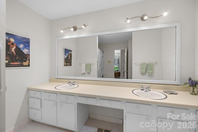 Set along a golf-course setting with a generous lot and room to on  in North Carolina - for sale on GolfHomes.com, golf home, golf lot