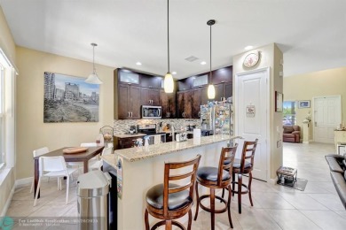 STUNNING 4-BEDROOM 3-BATHROOM POOL HOME IN THE HEART OF CORAL on Country Club of Coral Springs in Florida - for sale on GolfHomes.com, golf home, golf lot
