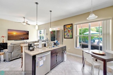STUNNING 4-BEDROOM 3-BATHROOM POOL HOME IN THE HEART OF CORAL on Country Club of Coral Springs in Florida - for sale on GolfHomes.com, golf home, golf lot