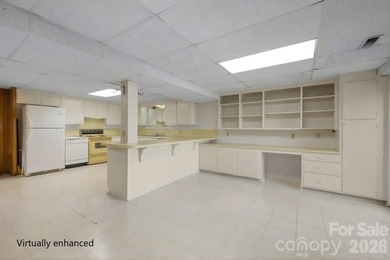 Set along a golf-course setting with a generous lot and room to on  in North Carolina - for sale on GolfHomes.com, golf home, golf lot