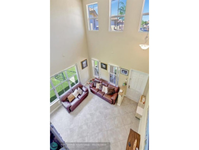 STUNNING 4-BEDROOM 3-BATHROOM POOL HOME IN THE HEART OF CORAL on Country Club of Coral Springs in Florida - for sale on GolfHomes.com, golf home, golf lot