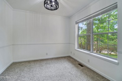 Enjoy lake views of St. George from this beautifully updated 1 on Druid Hills Golf Club in Tennessee - for sale on GolfHomes.com, golf home, golf lot
