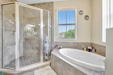STUNNING 4-BEDROOM 3-BATHROOM POOL HOME IN THE HEART OF CORAL on Country Club of Coral Springs in Florida - for sale on GolfHomes.com, golf home, golf lot