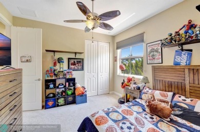 STUNNING 4-BEDROOM 3-BATHROOM POOL HOME IN THE HEART OF CORAL on Country Club of Coral Springs in Florida - for sale on GolfHomes.com, golf home, golf lot