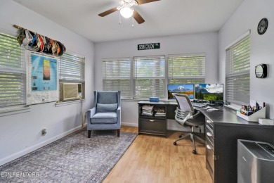 Enjoy lake views of St. George from this beautifully updated 1 on Druid Hills Golf Club in Tennessee - for sale on GolfHomes.com, golf home, golf lot