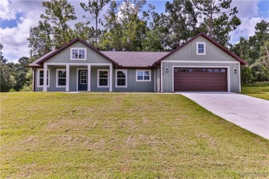 This 3/2/2 is brand new and sits on a third of an acre nicely on Citrus Springs Country Club in Florida - for sale on GolfHomes.com, golf home, golf lot