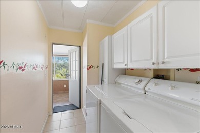 Enjoy golf course living at its finest in this beautifully on Fountain of the Sun Country Club in Arizona - for sale on GolfHomes.com, golf home, golf lot