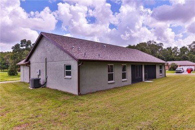 This 3/2/2 is brand new and sits on a third of an acre nicely on Citrus Springs Country Club in Florida - for sale on GolfHomes.com, golf home, golf lot