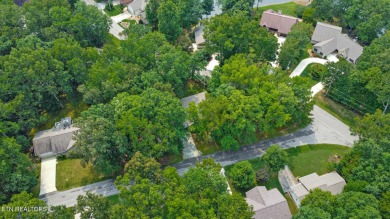 Enjoy lake views of St. George from this beautifully updated 1 on Druid Hills Golf Club in Tennessee - for sale on GolfHomes.com, golf home, golf lot