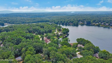Enjoy lake views of St. George from this beautifully updated 1 on Druid Hills Golf Club in Tennessee - for sale on GolfHomes.com, golf home, golf lot