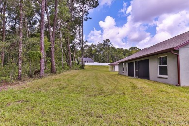 This 3/2/2 is brand new and sits on a third of an acre nicely on Citrus Springs Country Club in Florida - for sale on GolfHomes.com, golf home, golf lot